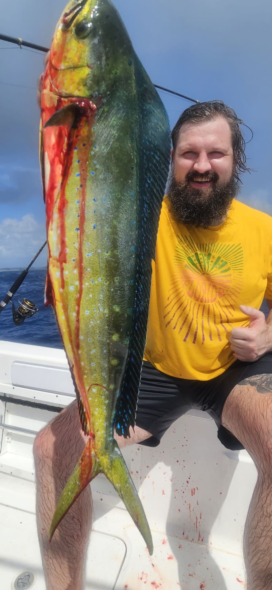 Angler with a large mahi-mahi caught offshore of Boynton Beach