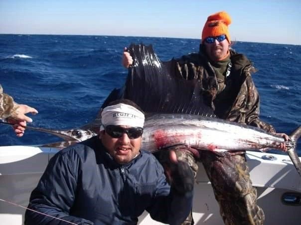 A sailfish brought aboard the Reel Deal