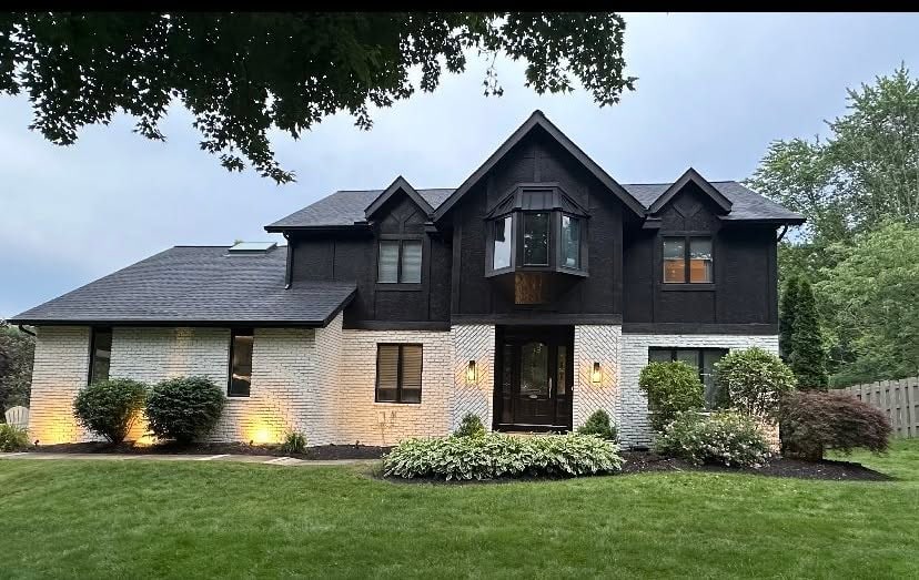 A modern house painted a dark color