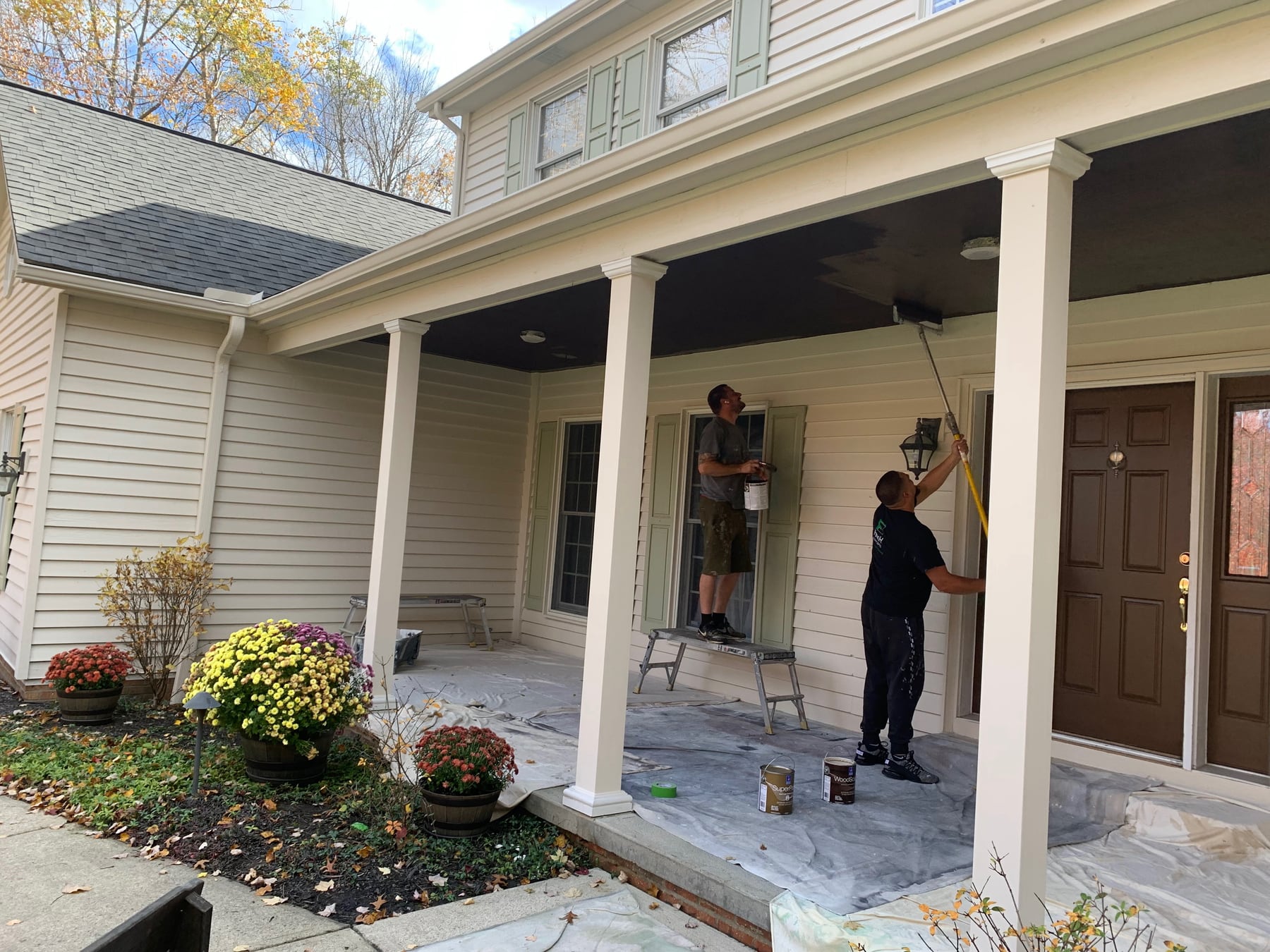 Our crew painting a porch