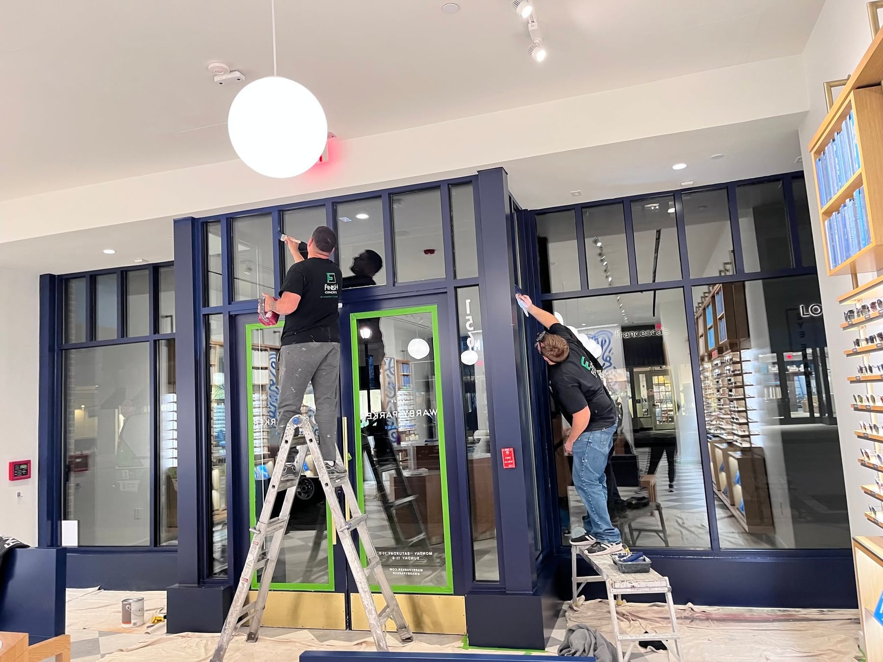 A wall of windows with fresh exterior trim