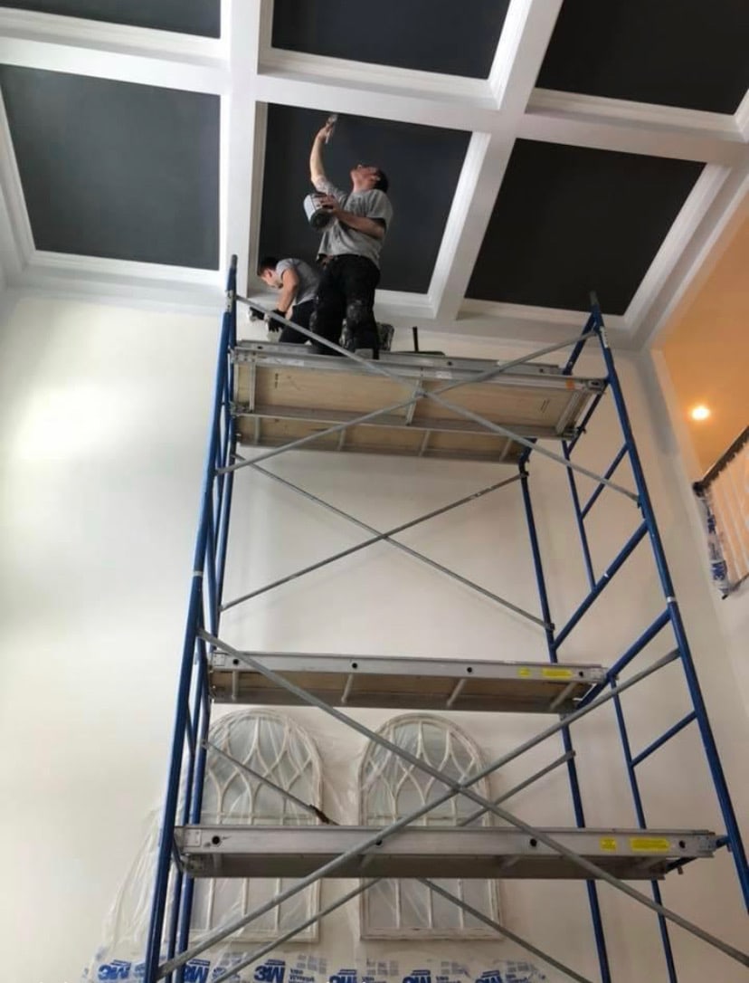 Scaffolding set up to paint a ceiling