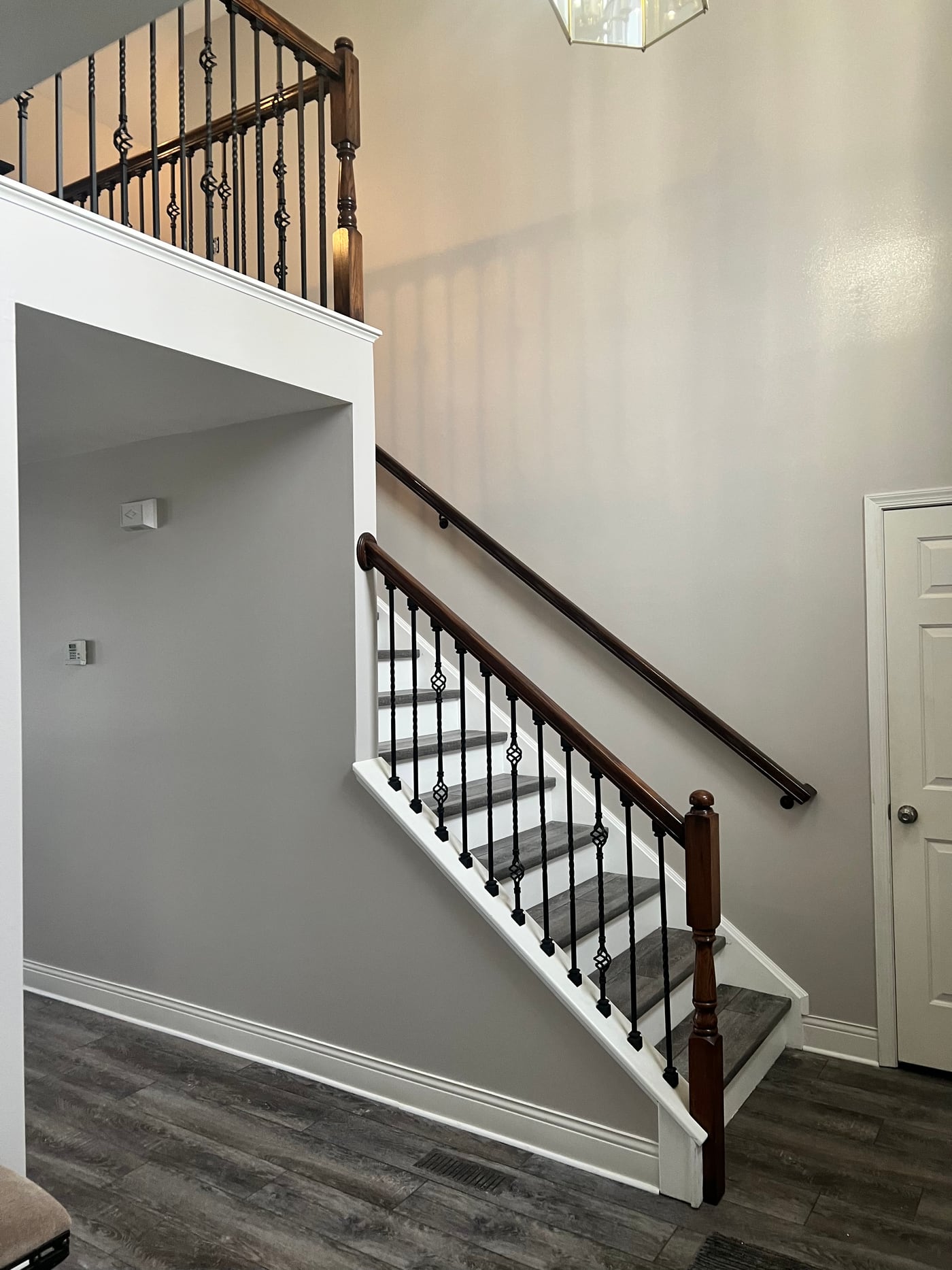 A greige stairway we painted
