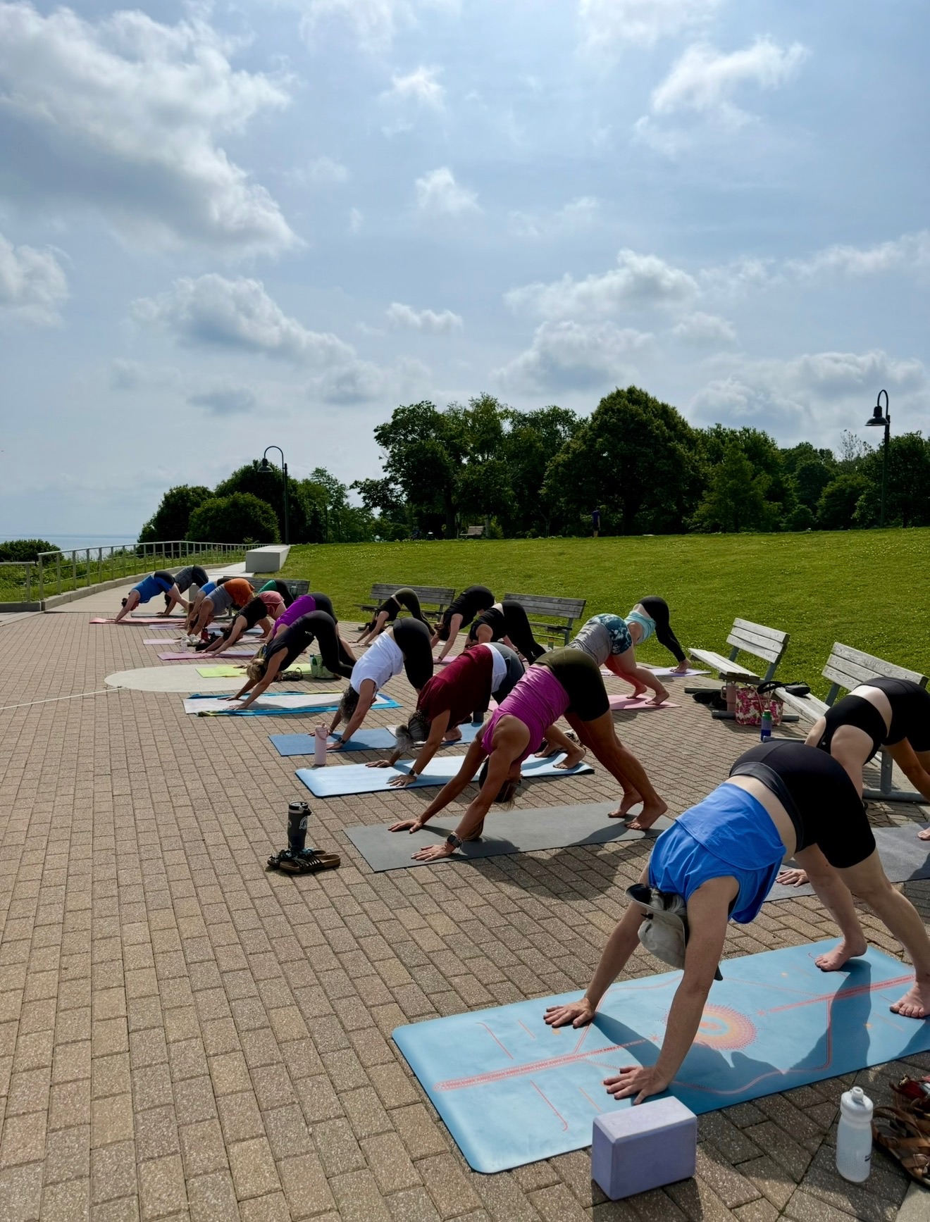 An outdoor yoga class with The Studio Cleveland