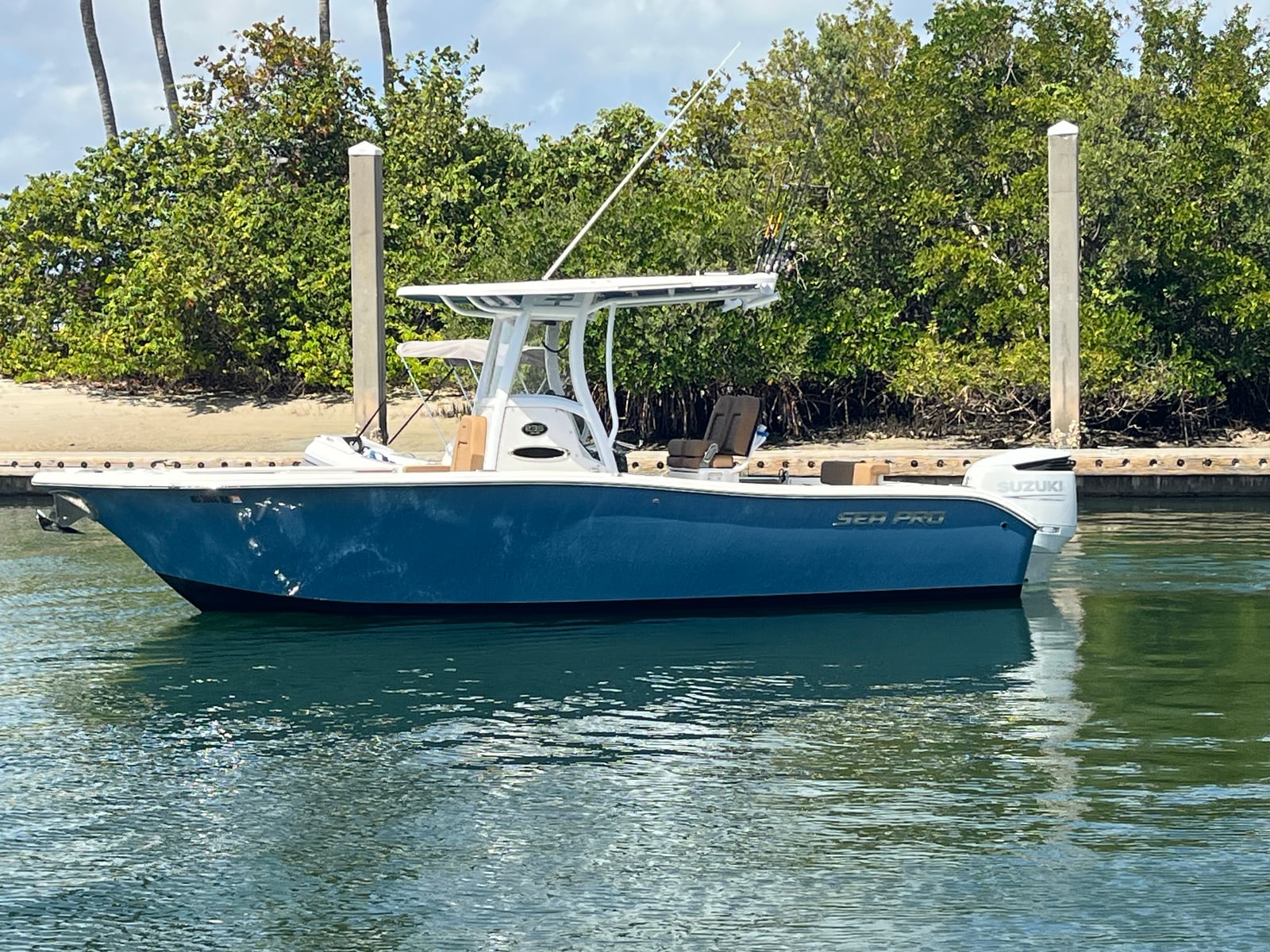 The boat tied up off the beach