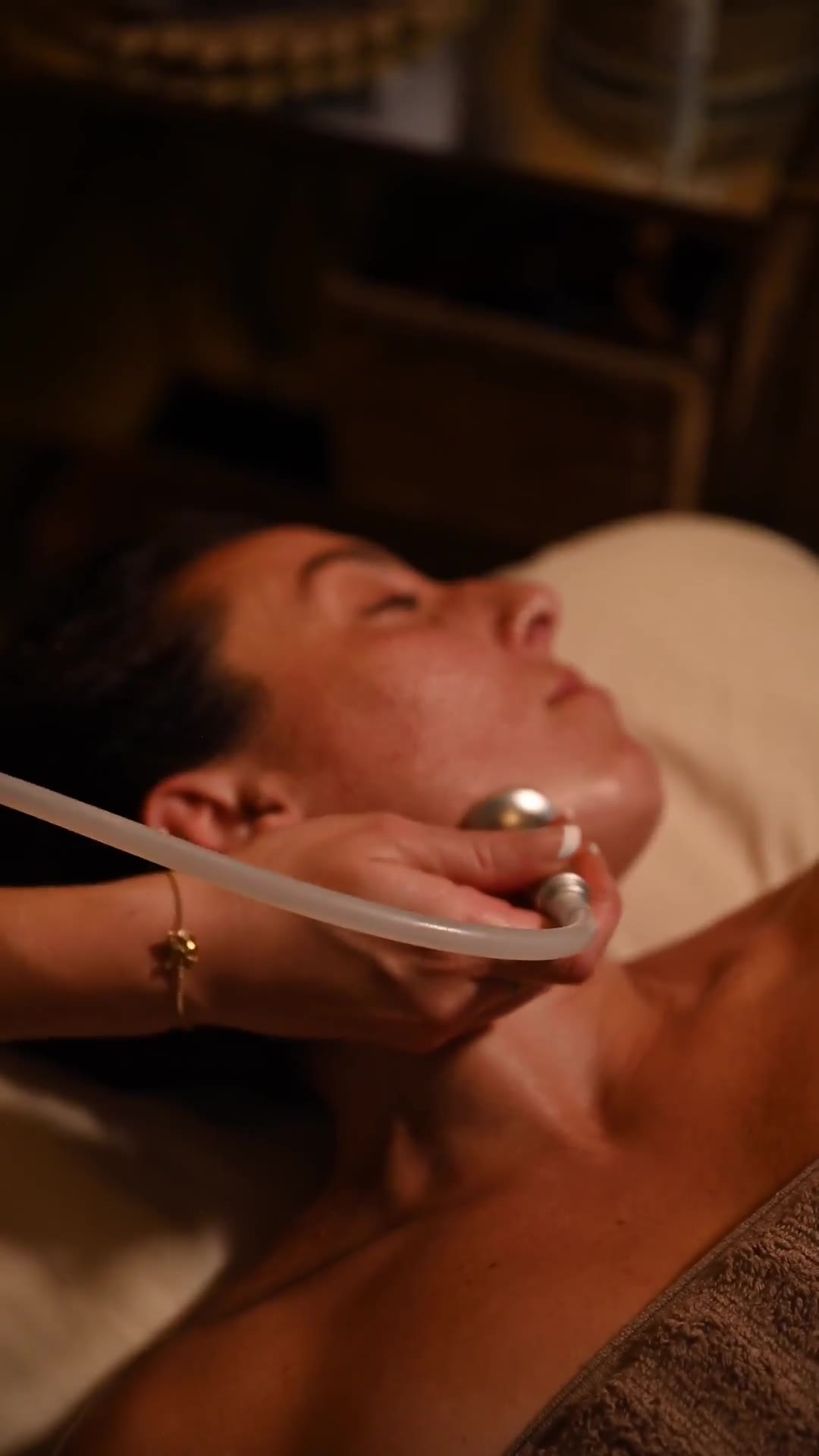 A facial lymphatic drainage treatment in progress at Sculpted by Lexi in Pacific Beach